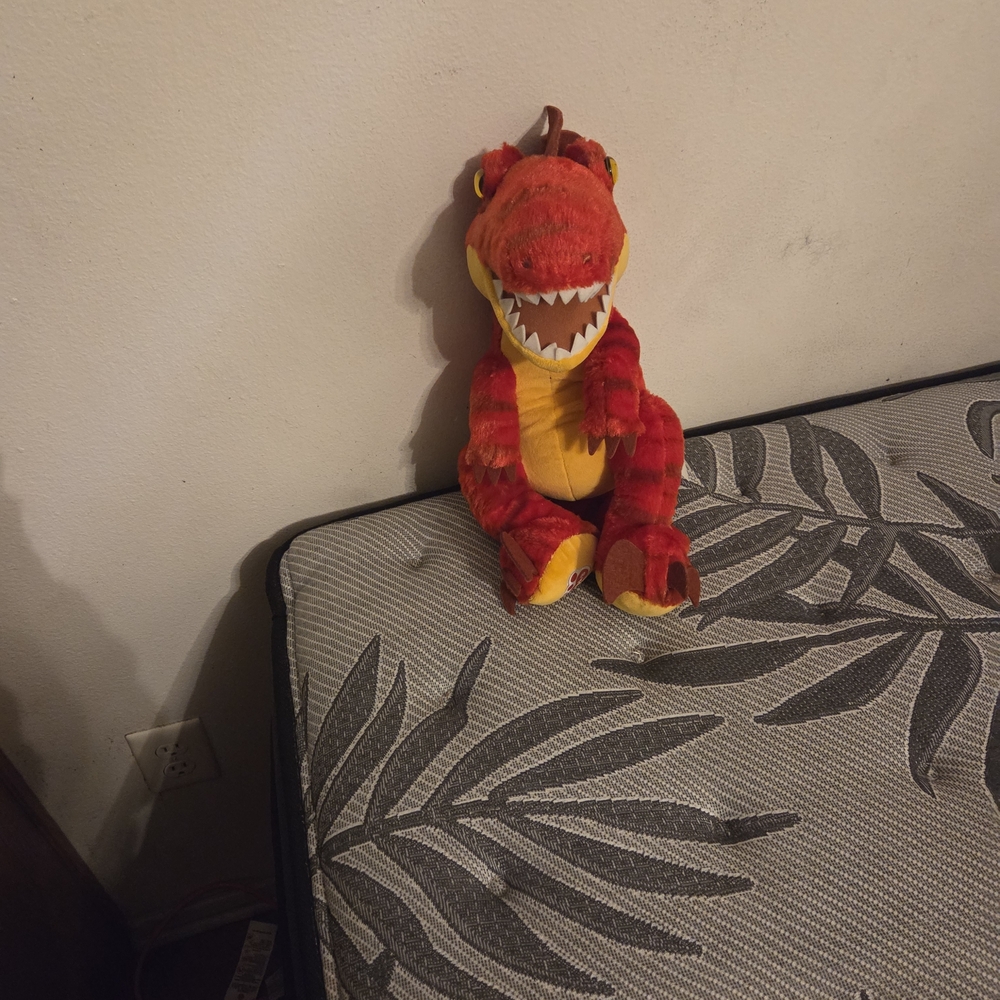 Cuddly Red and Yellow Dinosaur Plush Toy